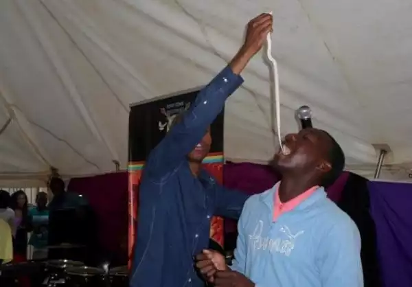 Nawa oo!! South African Pastor Makes Members Swallow Live Snake During Deliverance [See Photos]